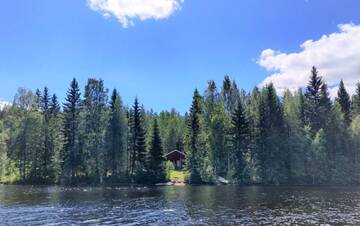 Фото номера Коттедж с 2 спальнями и сауной Дома для отпуска Lomavouti Cottages г. Савонранта 5