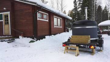Фото номера Коттедж с 2 спальнями и сауной Дома для отпуска Lomavouti Cottages г. Савонранта 19