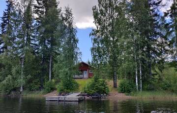 Фото номера Коттедж с 2 спальнями и сауной Дома для отпуска Lomavouti Cottages г. Савонранта 6