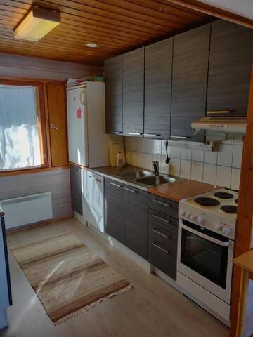 Фото номера Коттедж с 2 спальнями и сауной Дома для отпуска Lomavouti Cottages г. Савонранта 8