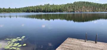 Фото номера Коттедж с 2 спальнями и сауной Дома для отпуска Lomavouti Cottages г. Савонранта 11