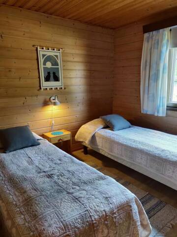 Фото номера Коттедж с 2 спальнями и сауной Дома для отпуска Lomavouti Cottages г. Савонранта 16