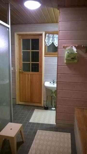 Фото номера Коттедж с 2 спальнями и сауной Дома для отпуска Lomavouti Cottages г. Савонранта 17